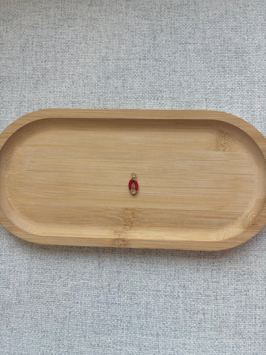 Breloque coquillage rouge