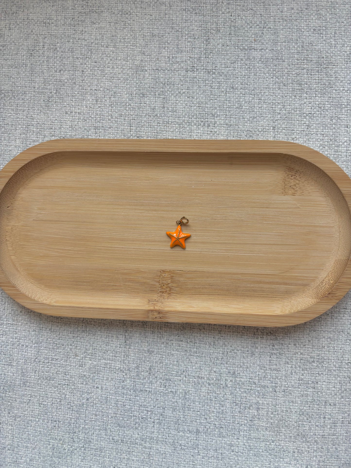 Breloque étoile orange