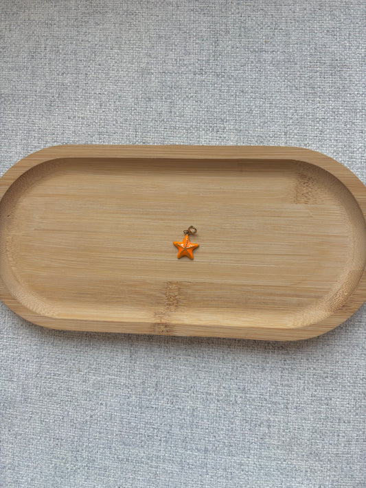 Breloque étoile orange