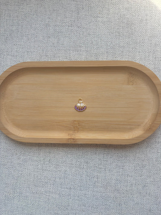 Breloque coquillage mauve