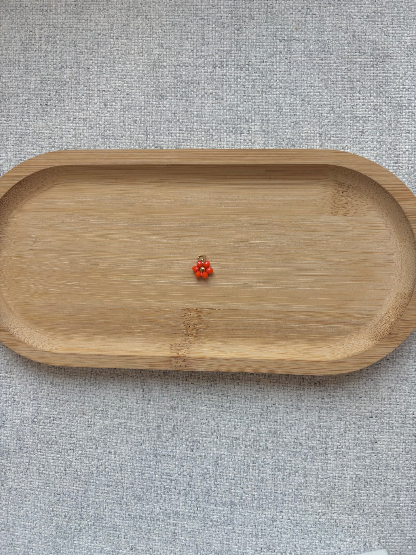 Breloque fleur orange