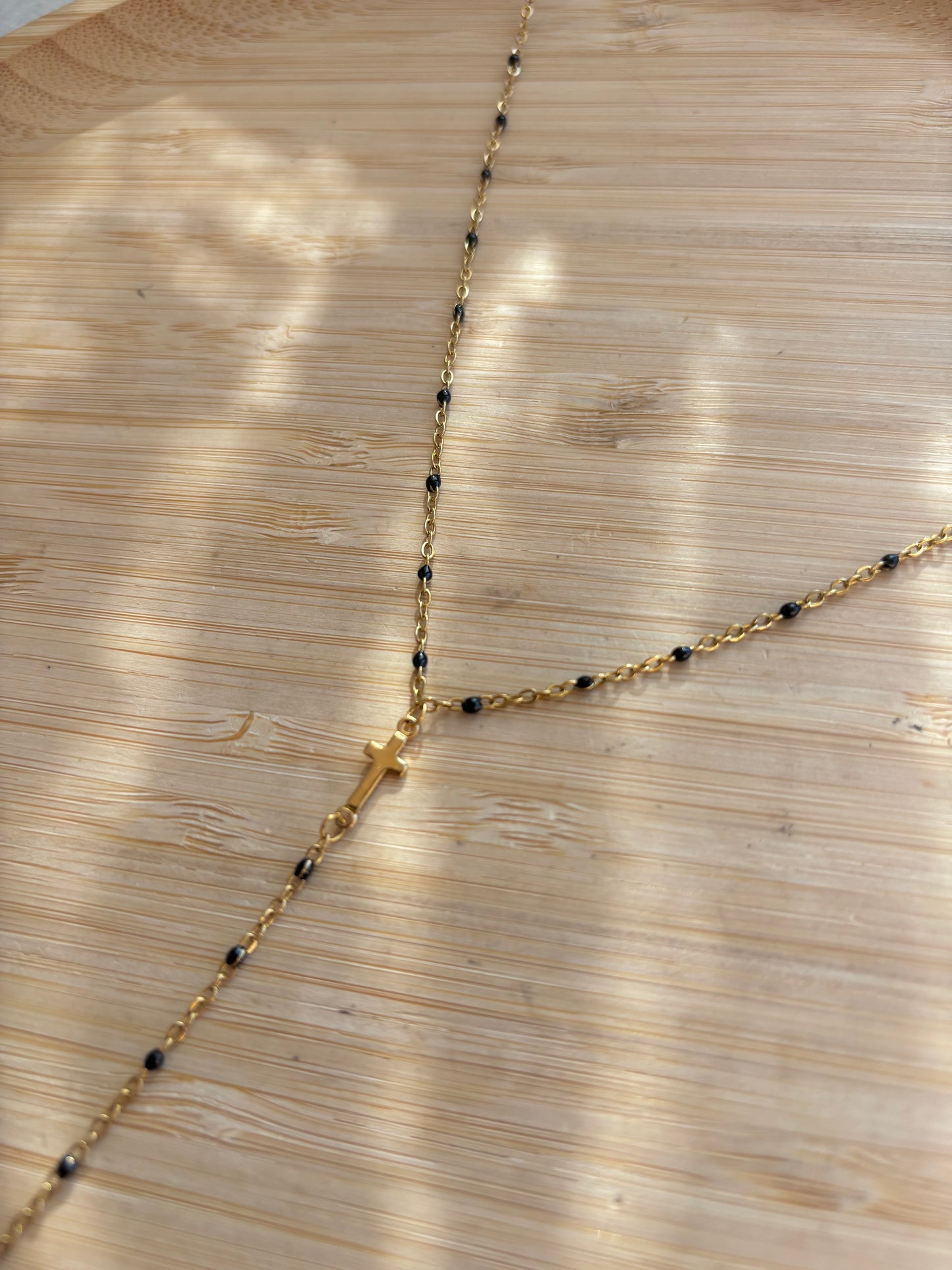 Collier en y croix